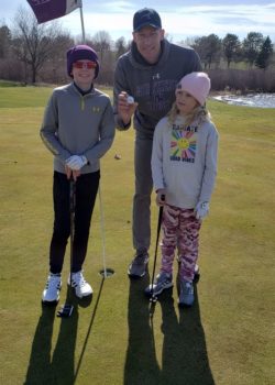 Larimer - hole-in-one Chris Larimer with his son Drew (age 12) and daughter Nora (age 8).