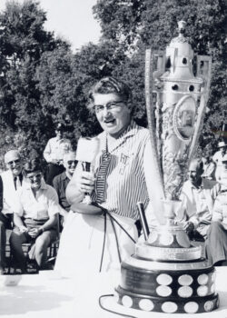 Image shows Ann Casey Johnstone with the 1957 U.S. Women's Amateur Championship trophy. (Copyright Unknown/Courtesy USGA Museum)